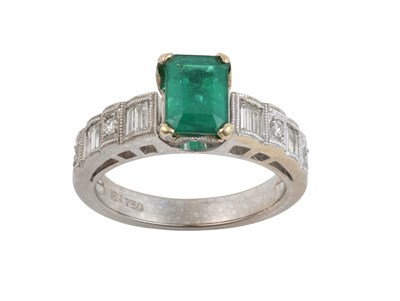 Lot 2258 - An Emerald and Diamond Ring the emerald-cut...