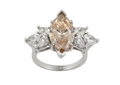 Lot 2307 - A Diamond Ring the fancy champagne marquise...