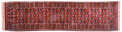 Lot 1284 - Beshir Runner, the deep indigo field of...
