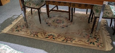 Lot 1493 - Chinese Rug, the field centered by a floral...