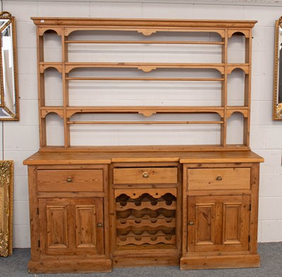 Lot 1461 - A Farmhouse Pine Dresser and Rack, the...