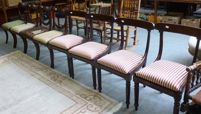 Lot 729 - A set of four mahogany Regency style dining chairs with red and cream striped seats and a set...