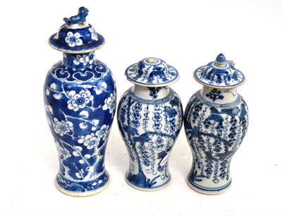 Lot 10 - Pair of Chinese blue and white vases and covers (a.f.) and another