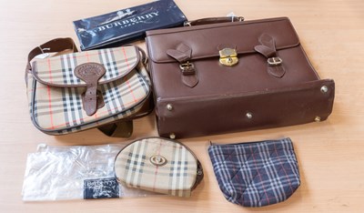 Lot 1195 - Burberry Bags comprising a tan briefcase, a...