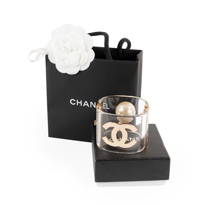 Lot 1031 - Chanel Lucite Faux Pearl, CC Cuff Bracelet,...