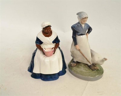 Lot 21 - A Royal Copenhagen figure of a girl with a goose and a Royal Doulton figure 'Royal Governor's Cook'