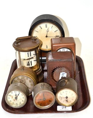 Lot 24 - A flick timepiece, calendar timepiece, mantel timepiece, four travelling timepieces, and a...