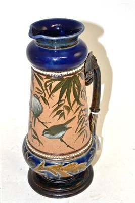 Lot 27 - A Doulton Lambeth stoneware jug, by Florence Barlow, pâte-sur-pâte decoration of blue...