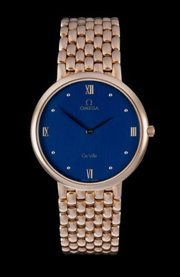 Lot 2391 - Omega: An 18 Carat Gold Wristwatch, signed...