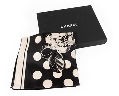 Lot 1032 - Chanel Camellia Silk Scarf, depicting black...