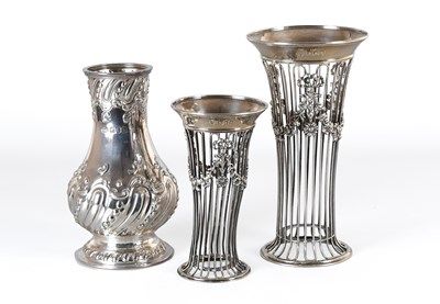 Lot 67 - A Graduated Pair of Edward VII Silver Vases
