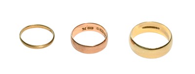 Lot 460 - Three 9 Carat Gold Band Rings, finger sizes J,...