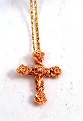 Lot 79 - A 14ct rose gold cross, on chain