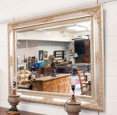 Lot 1379 - A Reproduction Silvered Mirror, the bevelled...