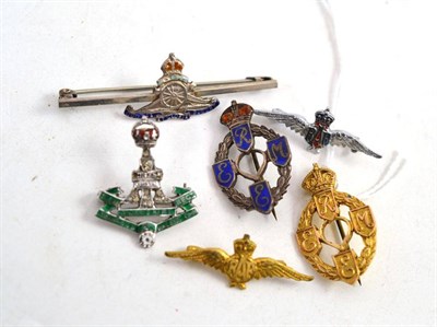 Lot 84 - Six regimental brooches - one stamped '9CT'