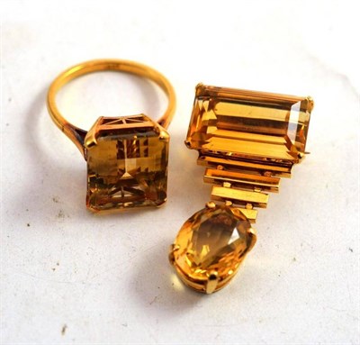 Lot 85 - A 9ct gold two stone citrine brooch and a citrine ring, stamped '18CT'