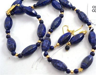 Lot 88 - A lapis lazuli type necklace and matching earrings