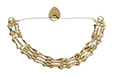 Lot 493 - A 9 Carat Gold Gate Link Bracelet, with heart...