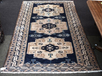Lot 1102 - Northwest Persian Rug, the indigo field with...
