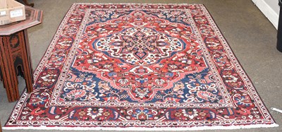 Lot 1106 - Bakhtiari Carpet, the raspberry field centred...