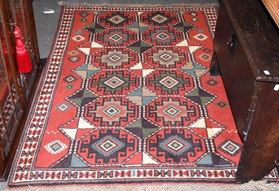 Lot 1101 - Kuchan Rug, the field with two columns of...