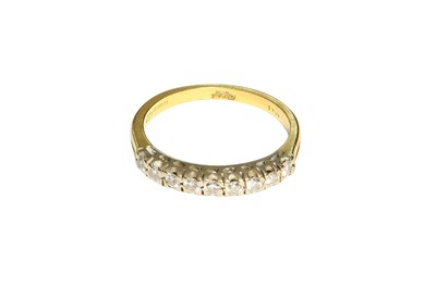 Lot 520 - An 18 Carat Gold Diamond Half Hoop Ring, nine...