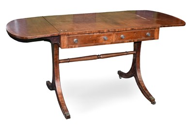 Lot 1328 - A Regency Crossbanded Mahogany Drop Leaf Sofa...