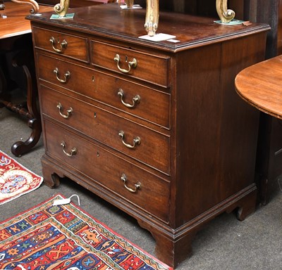 Lot 1249 - A George III Crossbanded Mahogany Chest of...