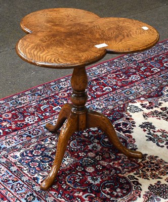 Lot 1256 - A Reproduction Elm Tripod Wine Table, with...