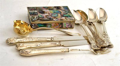 Lot 119 - Silver bladed tea knives, silver pickle fork, six plated teaspoons, white metal box and a...