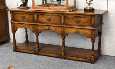 Lot 1349 - A Reproduction Oak Dresser Base, in Titchmarsh...