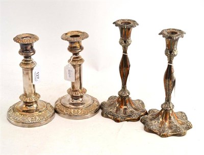 Lot 127 - Pair of plated telescopic candlesticks and a pair of loaded plated candlesticks (4)