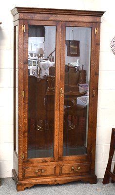 Lot 1352 - A 20th Century Bryn Hall Oak Display Cabinet,...