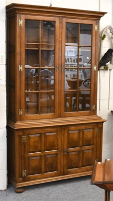 Lot 1348 - A 20th Century Oak Bookcase Cabinet, possibly...