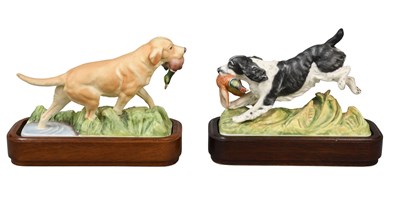 Lot 251 - Two Royal Worcester Porcelain Models "Springer...