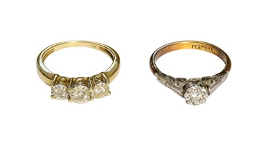Lot 516 - A Diamond Solitaire Ring, stamped '18CT' and...