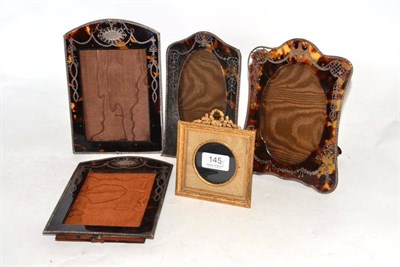 Lot 145 - Four silver and tortoiseshell photograph frames and a gilt photograph frame