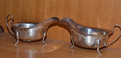 Lot 147 - A pair of silver sauceboats