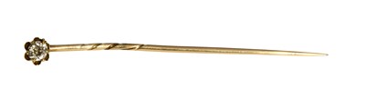 Lot 483 - A Diamond Stickpin, the old cut diamond in a...