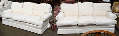 Lot 1267 - A Pair of Cream Upholstered Modern Three...