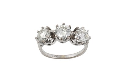 Lot 2245 - A Diamond Three Stone Ring the round brilliant...