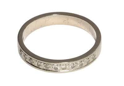 Lot 305 - An 18 Carat White Gold Diamond Half Hoop Ring,...
