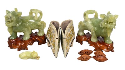Lot 339 - A Pair of Chinese Carved Jade Models of Lion...