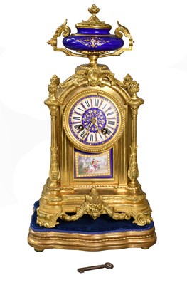 Lot 399 - A French Gilt Metal Porcelain-Mounted Striking...