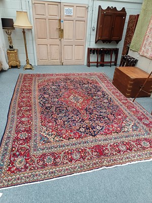 Lot 1113 - Kashan Design Carpet, the indigo field of...