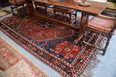 Lot 1328 - Khamseh Carpet, the madder field cented by an...