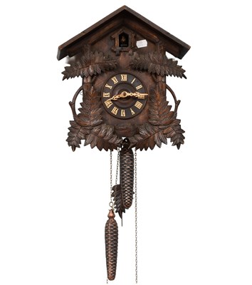 Lot 1280 - A Black Forest Cuckoo Wall Clock, 20th century,...