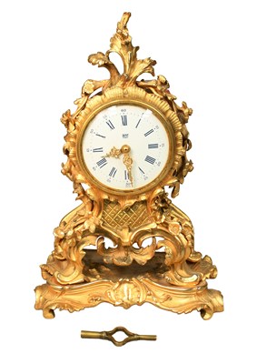 Lot 310 - A Gilt Metal Mantel Timepiece, dial bearing a...