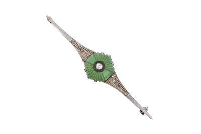 Lot 149 - An Art Deco Onyx, Diamond and Green Stone...