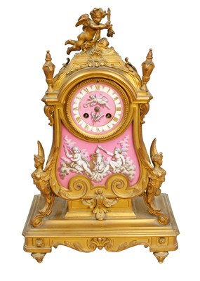 Lot 397 - A French Gilt Metal and Pink Porcelain...